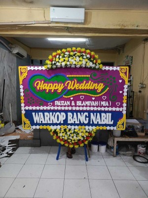 Papan Bunga Saung Bogania Cibinong